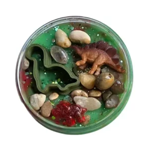 Pot sensorydough dino's van bovenaf met beeld op speelfiguren